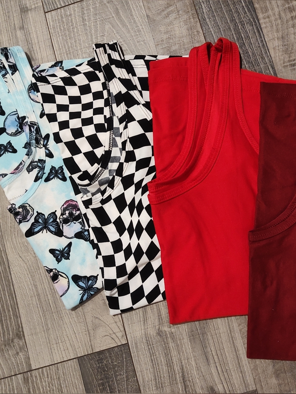 Four Tank Tops - Butterflies, Checkered, Bright Red, and Burgundy